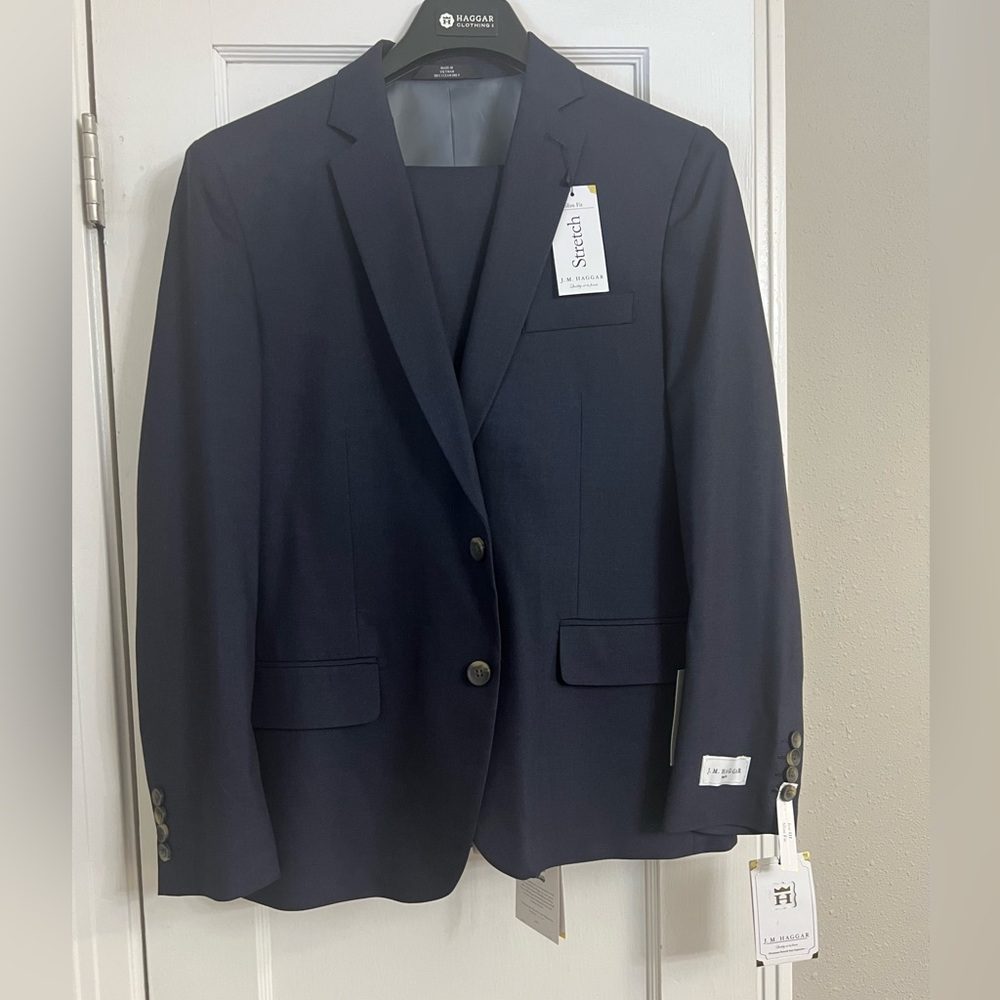 Navy blue brand new suit , never worn
